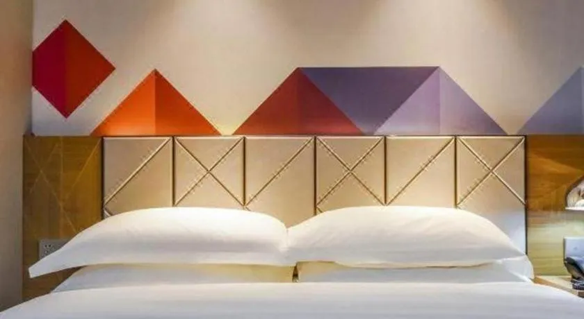 Bed in Borrman Hotel Guangzhou Quzhuang Metro Station