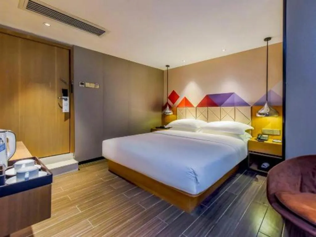 Bed in Borrman Hotel Guangzhou Quzhuang Metro Station