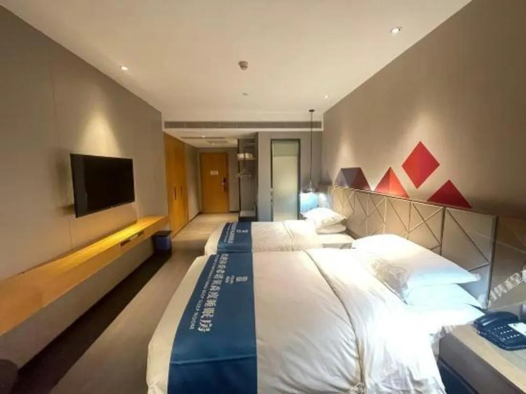 Bed in Borrman Hotel Guangzhou Quzhuang Metro Station