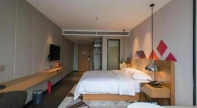 Bed in Borrman Hotel Guangzhou Quzhuang Metro Station