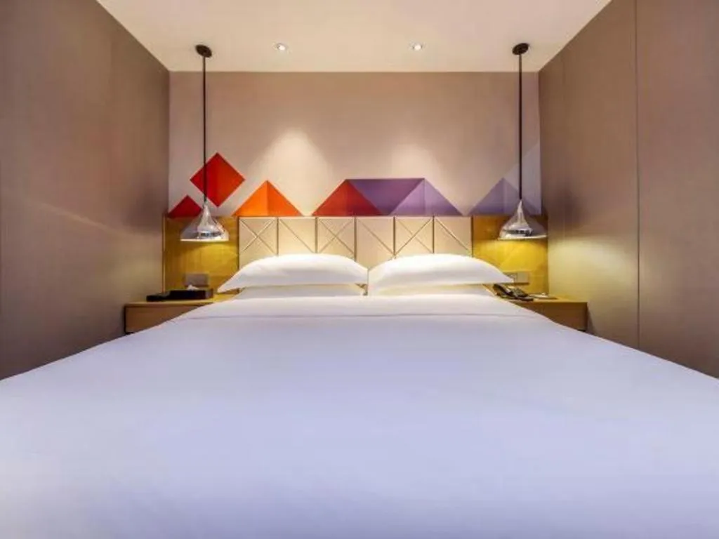 Bed in Borrman Hotel Guangzhou Quzhuang Metro Station