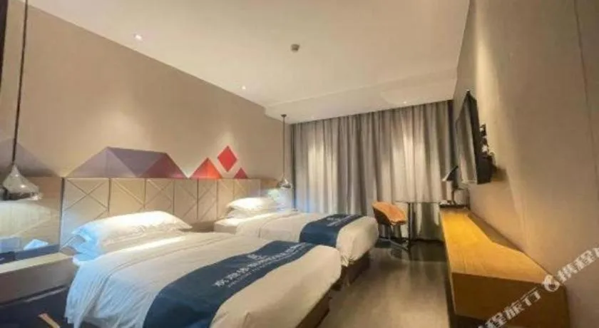 Bed in Borrman Hotel Guangzhou Quzhuang Metro Station