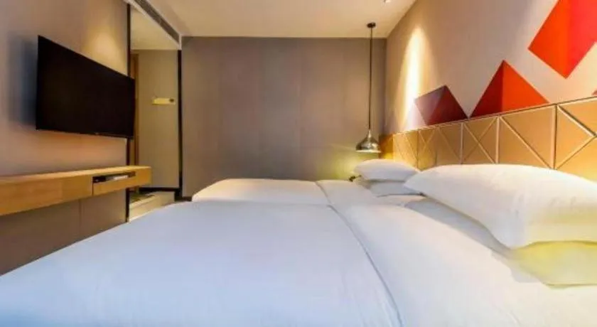 Bed in Borrman Hotel Guangzhou Quzhuang Metro Station