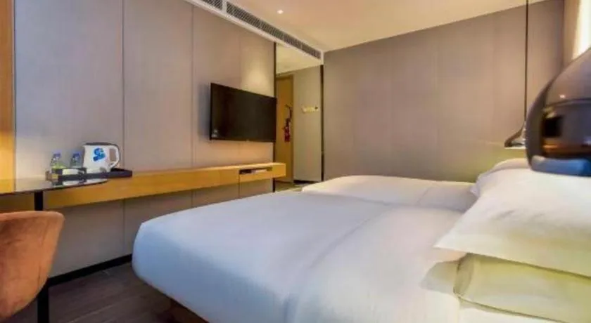 Bed in Borrman Hotel Guangzhou Quzhuang Metro Station