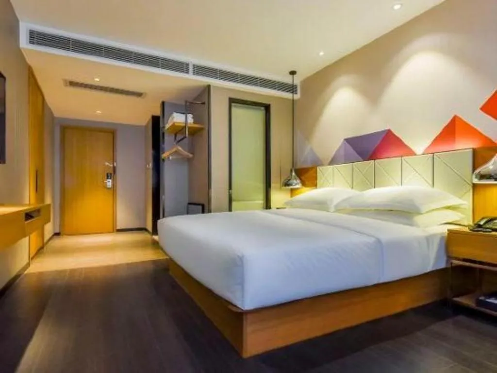 Bed in Borrman Hotel Guangzhou Quzhuang Metro Station