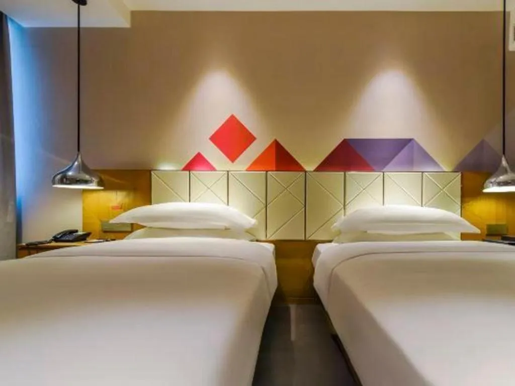 Bed in Borrman Hotel Guangzhou Quzhuang Metro Station