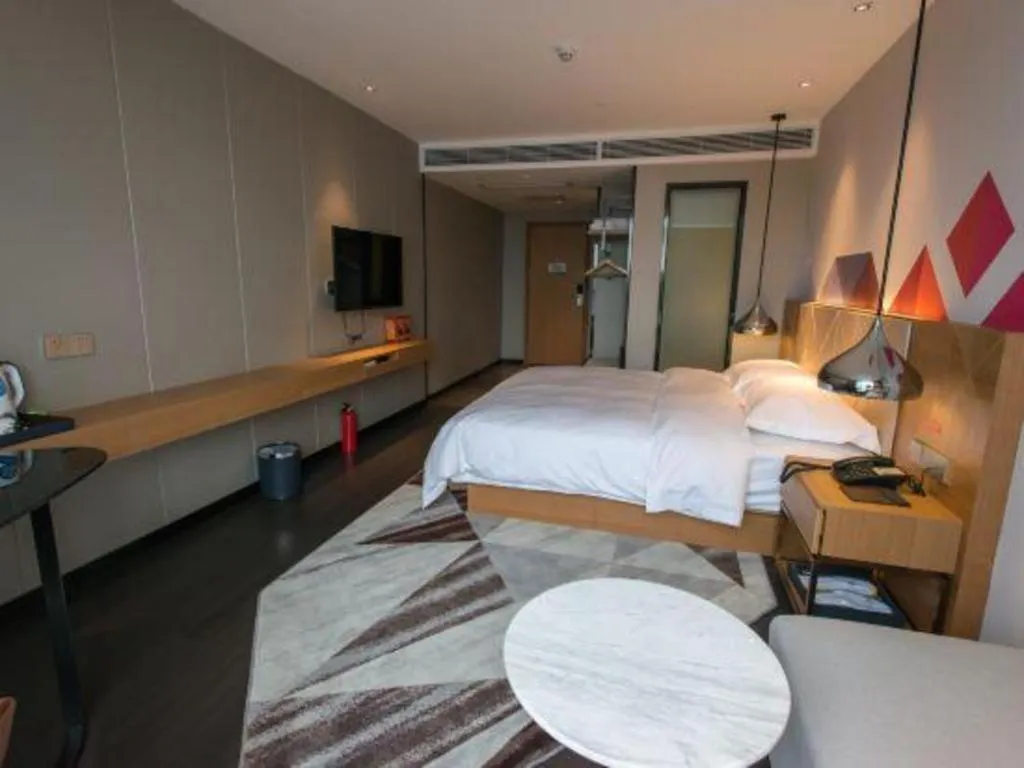 Bed in Borrman Hotel Guangzhou Quzhuang Metro Station