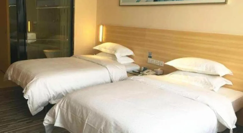 Bed in City Comfort Inn Guangzhou Zhongluotan Culture Square