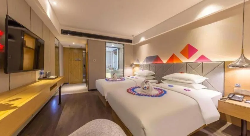 Bed in Borrman Hotel Kunming Dianchi South Asia Fengqingyuan