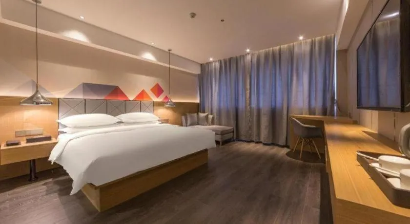 Bed in Borrman Hotel Kunming Dianchi South Asia Fengqingyuan