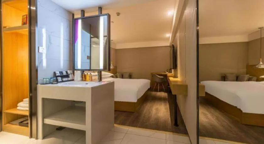 Bed in Borrman Hotel Kunming Dianchi South Asia Fengqingyuan