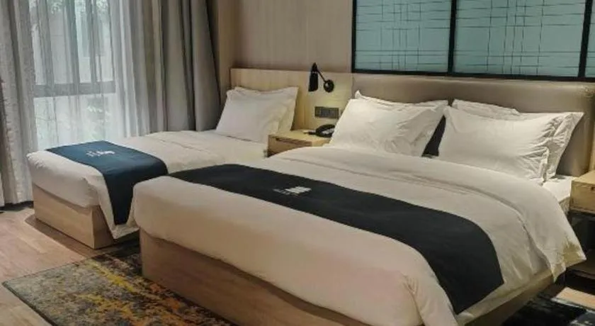 Bed in Echarm Hotel Kunming High-tech Zone Economic Management College