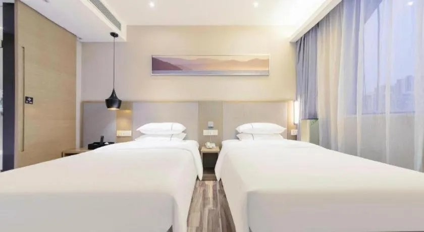 Bed in City Comfort Inn Wuhan Xudong Street Wangjiadun Metro Station