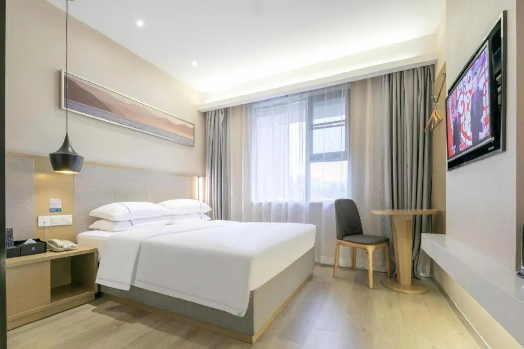 Bed in City Comfort Inn Wuhan Xudong Street Wangjiadun Metro Station