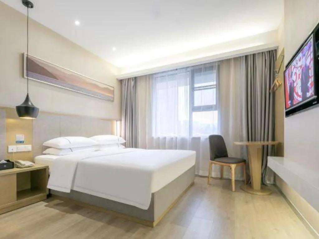 Bed in City Comfort Inn Wuhan Xudong Street Wangjiadun Metro Station