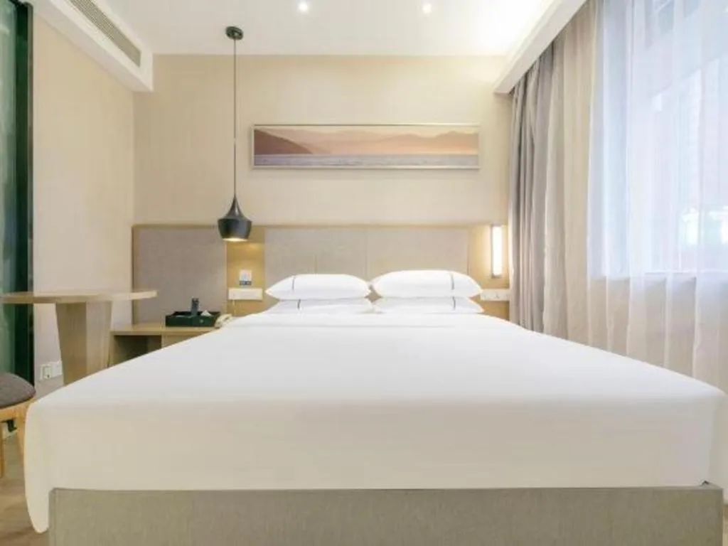 Bed in City Comfort Inn Wuhan Xudong Street Wangjiadun Metro Station