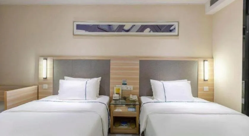 Bed in City Comfort Inn Wuhan Xudong Street Wangjiadun Metro Station