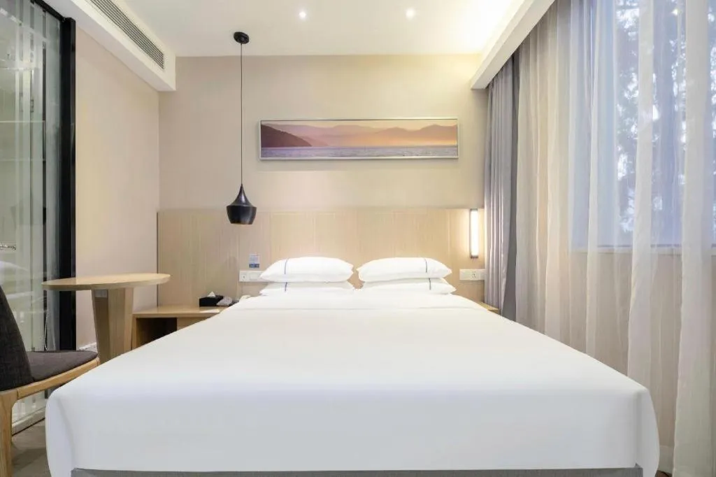 Bed in City Comfort Inn Wuhan Xudong Street Wangjiadun Metro Station
