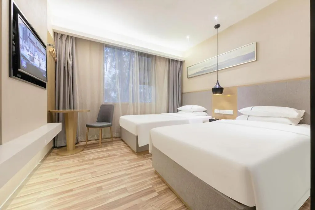 Bed in City Comfort Inn Wuhan Xudong Street Wangjiadun Metro Station