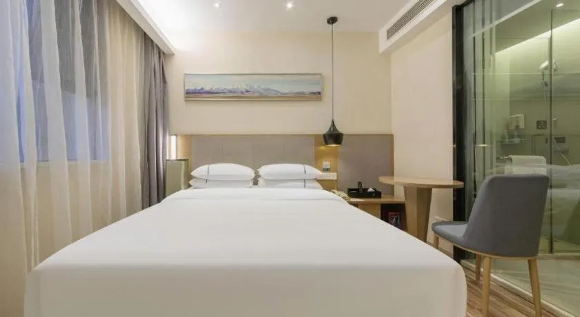 Bed in City Comfort Inn Wuhan Xudong Street Wangjiadun Metro Station