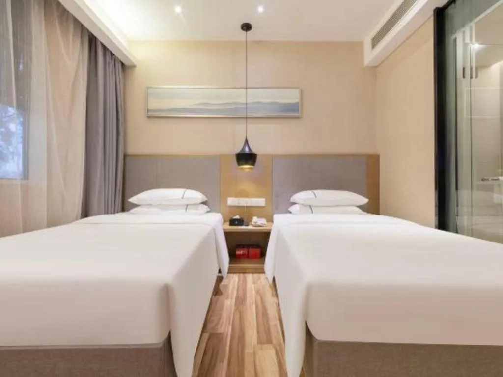 Bed in City Comfort Inn Wuhan Xudong Street Wangjiadun Metro Station