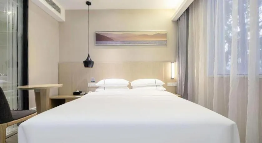 Bed in City Comfort Inn Wuhan Xudong Street Wangjiadun Metro Station