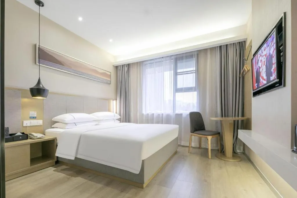 Bed in City Comfort Inn Wuhan Xudong Street Wangjiadun Metro Station