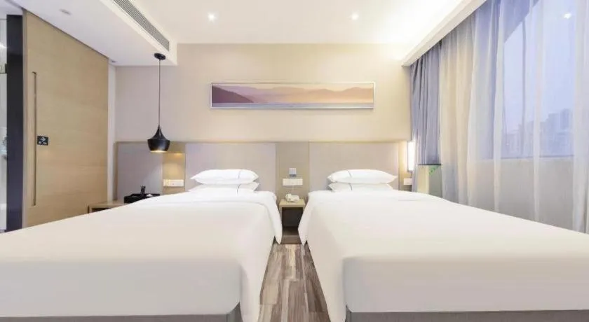 Bed in City Comfort Inn Wuhan Xudong Street Wangjiadun Metro Station