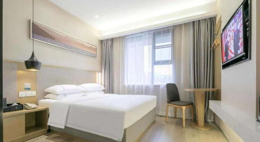 Bed in City Comfort Inn Wuhan Xudong Street Wangjiadun Metro Station
