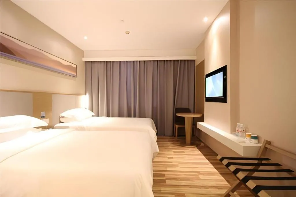 Bed in City Comfort Inn Wuhan Xudong Street Wangjiadun Metro Station