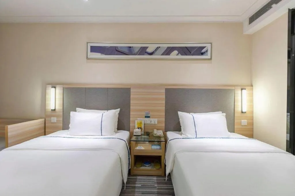 Bed in City Comfort Inn Wuhan Xudong Street Wangjiadun Metro Station