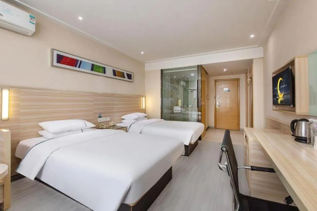 Bed in City Comfort Inn Wuhan Fengshu Er Road Baijin Mansion