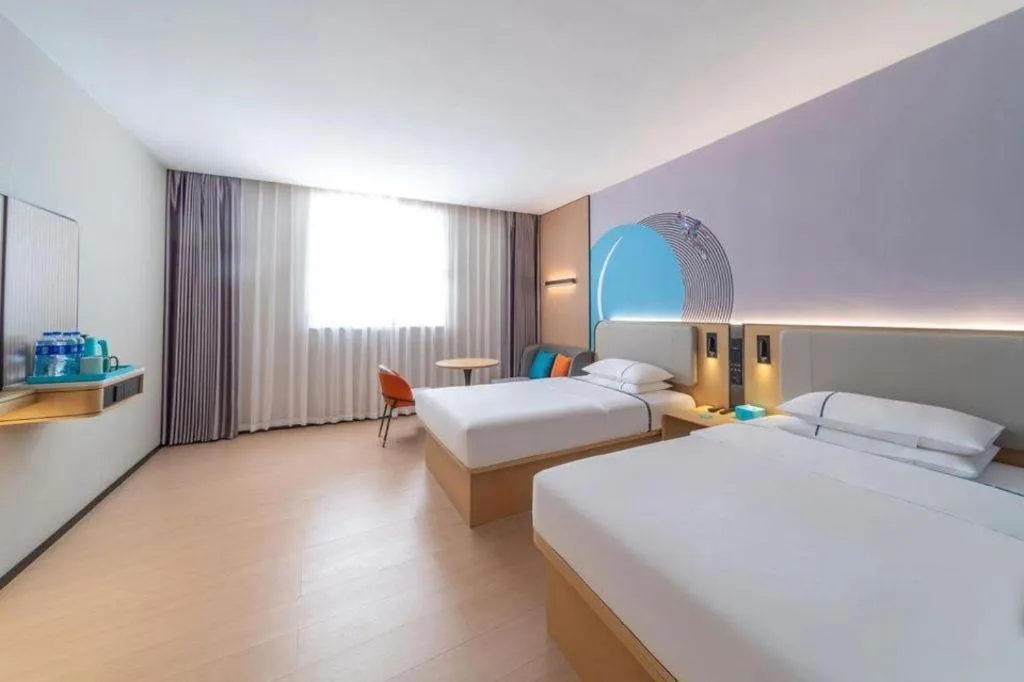 Bed in City Comfort Inn Zhongshan Nanqu Subdistrict Yong'an Square
