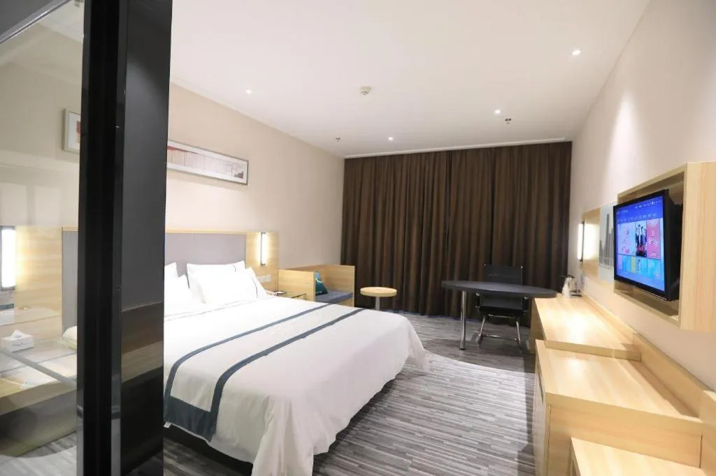 Bed in City Comfort Inn Zhongshan Nanqu Subdistrict Yong'an Square
