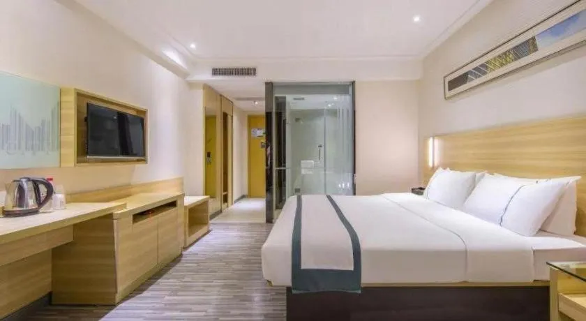 Bed in City Comfort Inn Zhongshan Nanqu Subdistrict Yong'an Square