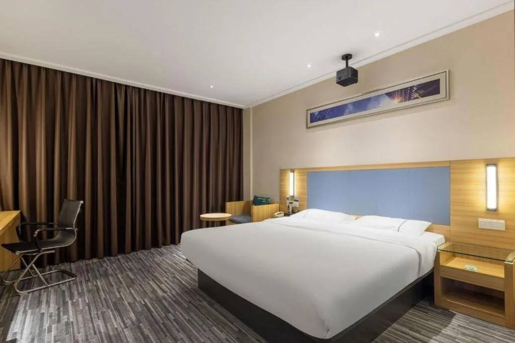 Bed in City Comfort Inn Zhongshan Nanqu Subdistrict Yong'an Square