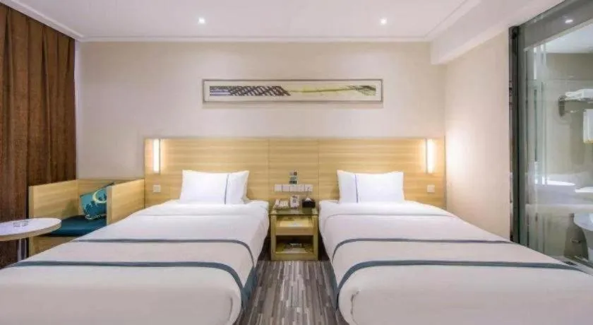 Bed in City Comfort Inn Zhongshan Nanqu Subdistrict Yong'an Square