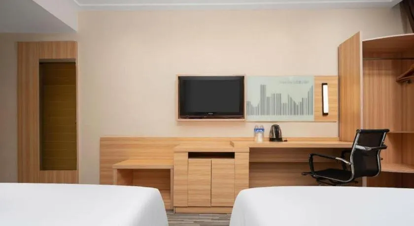 Bed in City Comfort Inn Wuhan Huanghe Tower Shouyi Metro Station