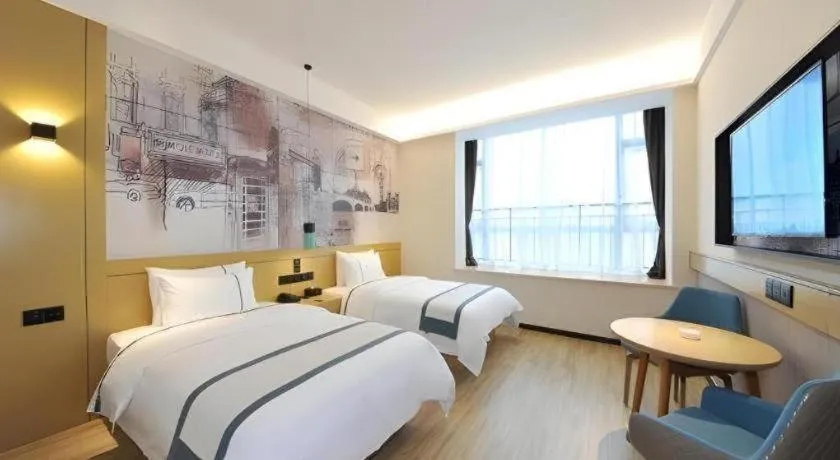 Bed in City Comfort Inn Chengdu Wenjiang University Town Fengxi River Metro Station