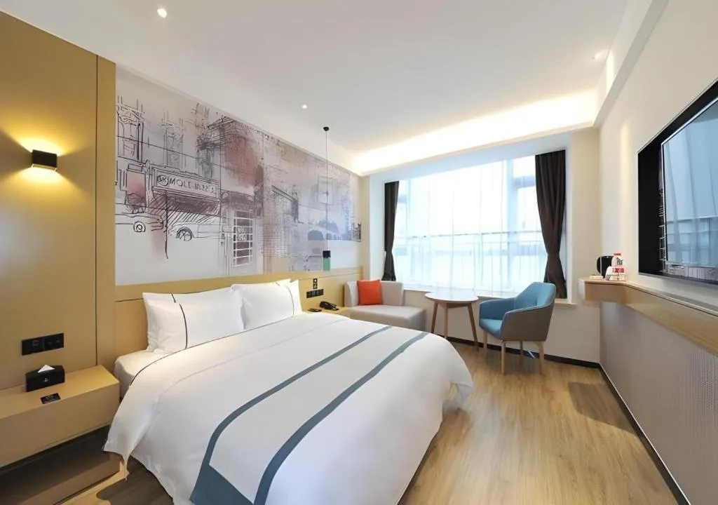 Bed in City Comfort Inn Chengdu Wenjiang University Town Fengxi River Metro Station