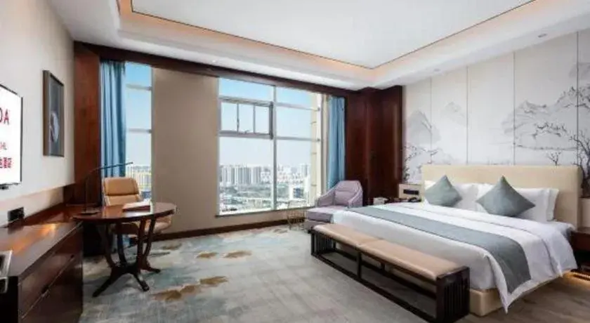 Bed in Ramada by Wyndham Wuhan Dongxihu Bed in Ramada by Wyndham Wuhan Dongxihu