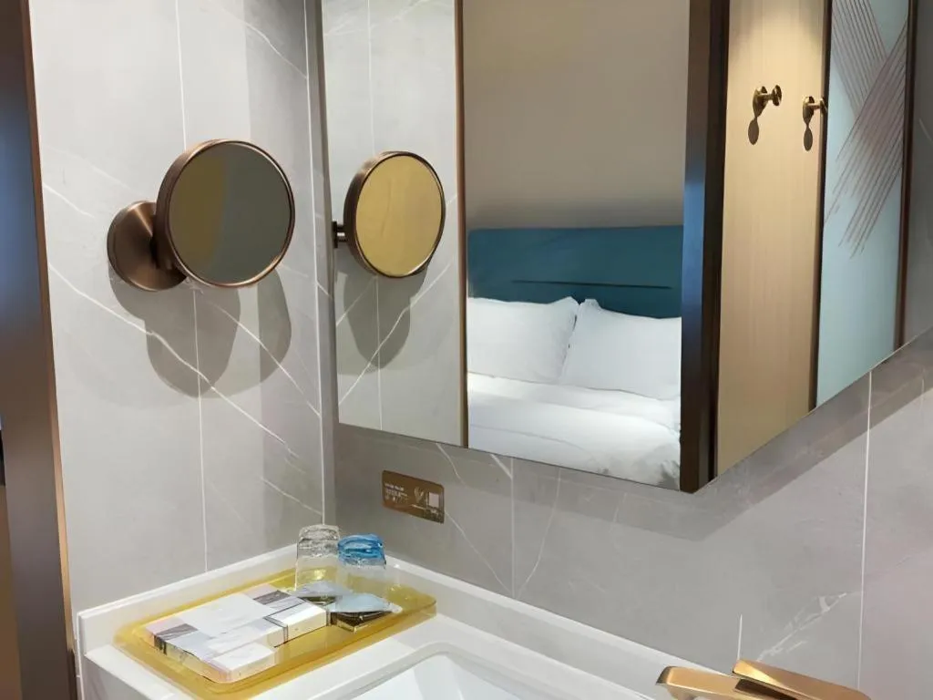 Bed in ZMAX Hotels Shenzhen Lianhuacun Metro Station