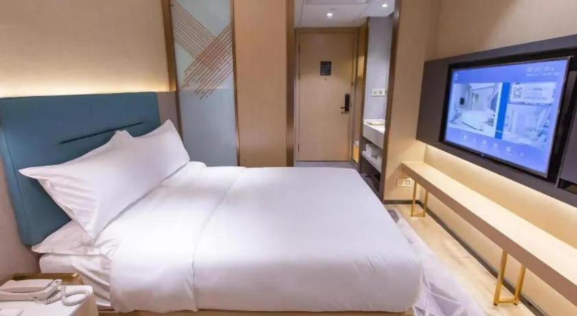 Bed in ZMAX Hotels Shenzhen Lianhuacun Metro Station