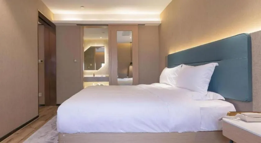 Bed in ZMAX Hotels Shenzhen Lianhuacun Metro Station