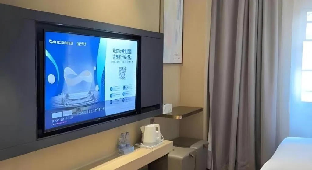 Bed in ZMAX Hotels Shenzhen Lianhuacun Metro Station