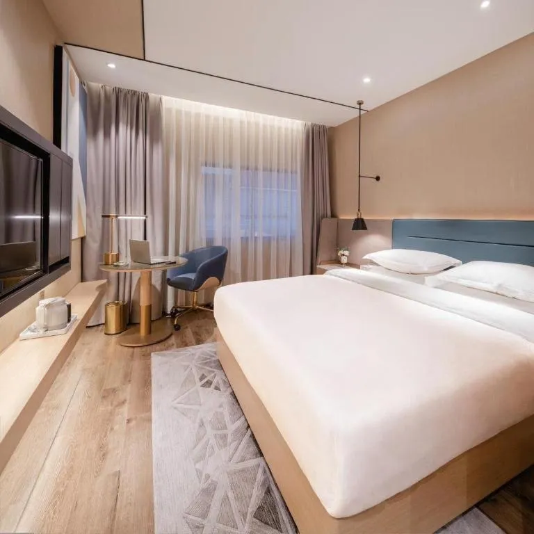 Bed in ZMAX Hotels Shenzhen Lianhuacun Metro Station