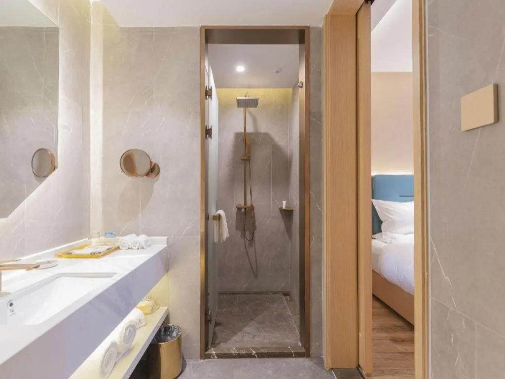 Bed in ZMAX Hotels Shenzhen Lianhuacun Metro Station