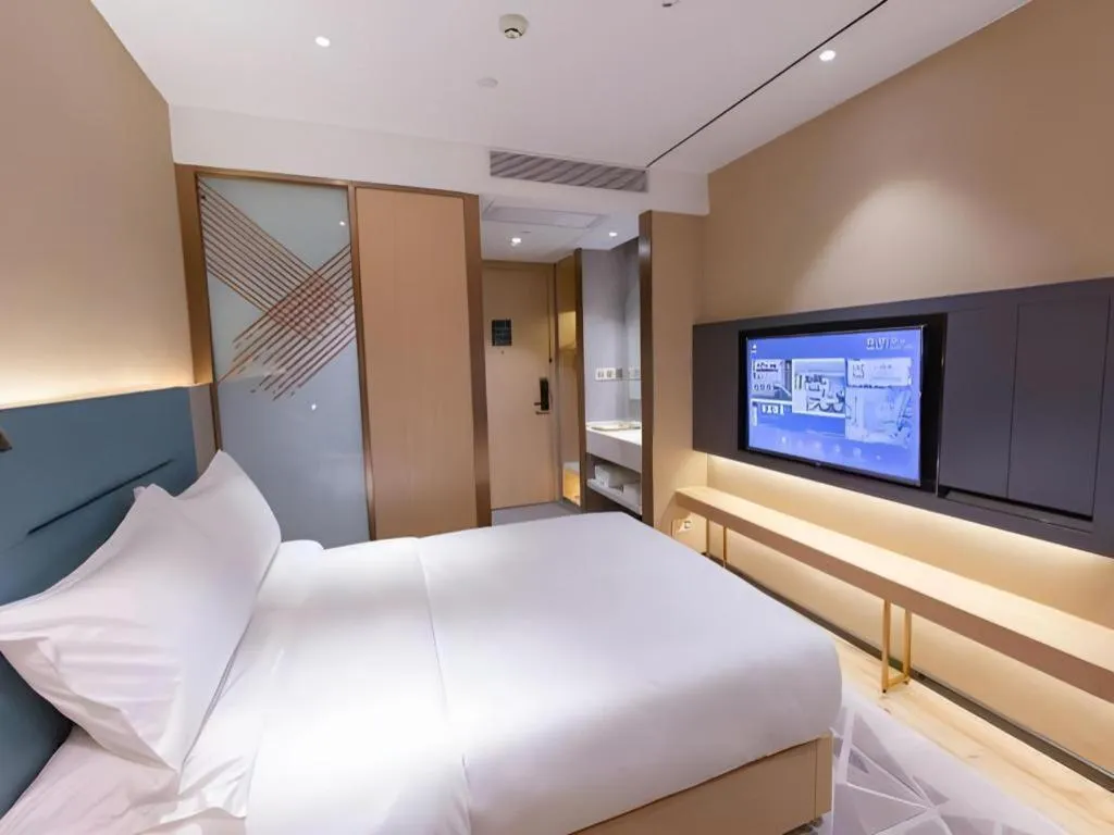 Bed in ZMAX Hotels Shenzhen Lianhuacun Metro Station