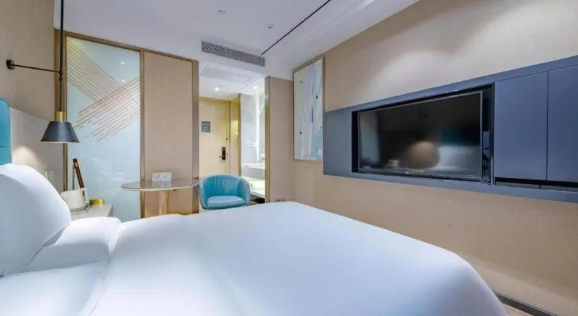 Bed in ZMAX Hotels Shenzhen Lianhuacun Metro Station