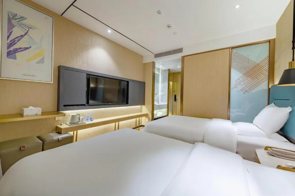 Bed in ZMAX Hotels Shenzhen Lianhuacun Metro Station